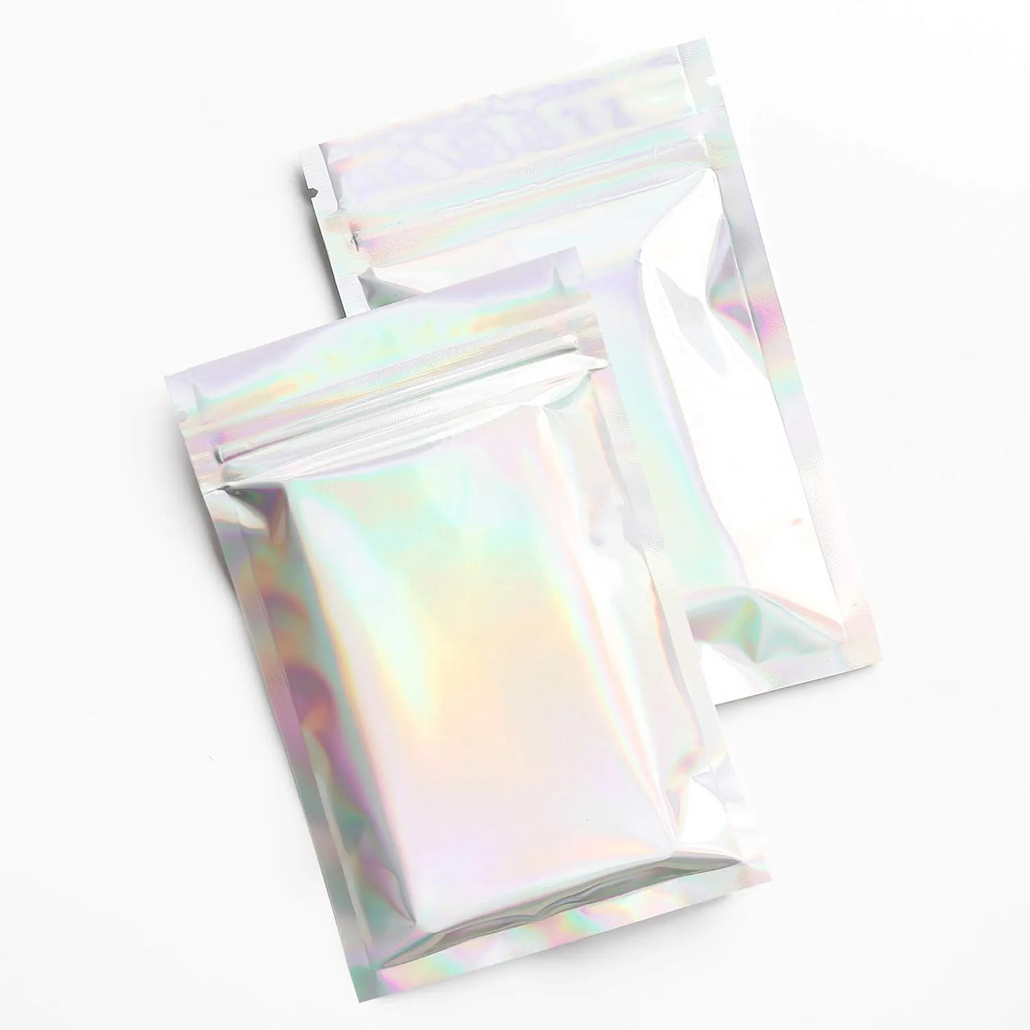 QQ Studio Pack of 100 Rainbow Holographic Double-Sided Zipper Bags for Cosmetics and Makeup (8.5x13cm (3.3x5.1"), Silver Hologram)